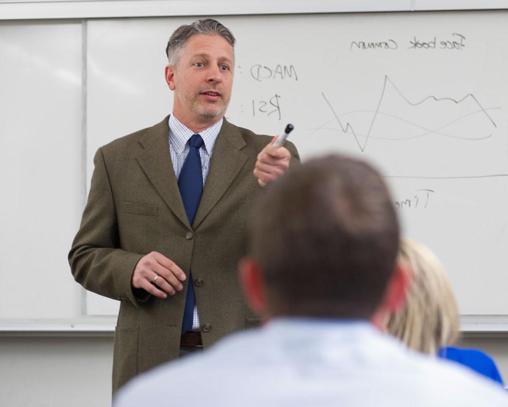 Professor calling on a student in class